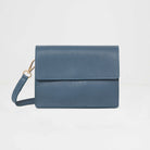 Anzio Clutch Bag with Leather Strap Denim Blue | Betsy & Floss