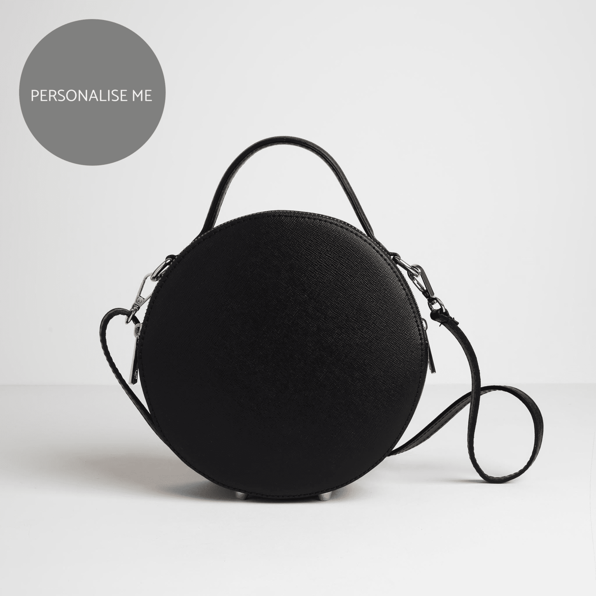 Round black crossbody bag on sale